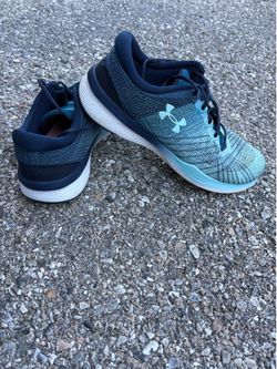 Women’s size 8.5 Under Armour running/walking shoes.