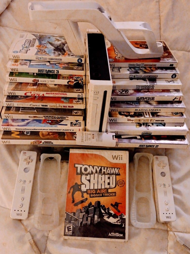 Wii GAMING SYSTEM & 17 GAMES UNTESTED