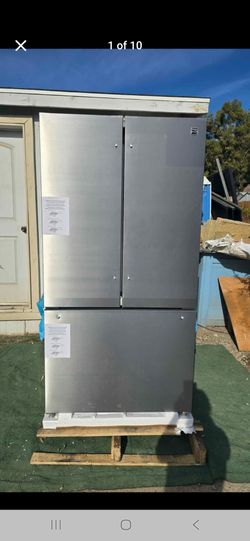 Kenmore 20.3 cu.ft. Counter depth 3 door bottom freezer refrigerator in stainless steel with e-star