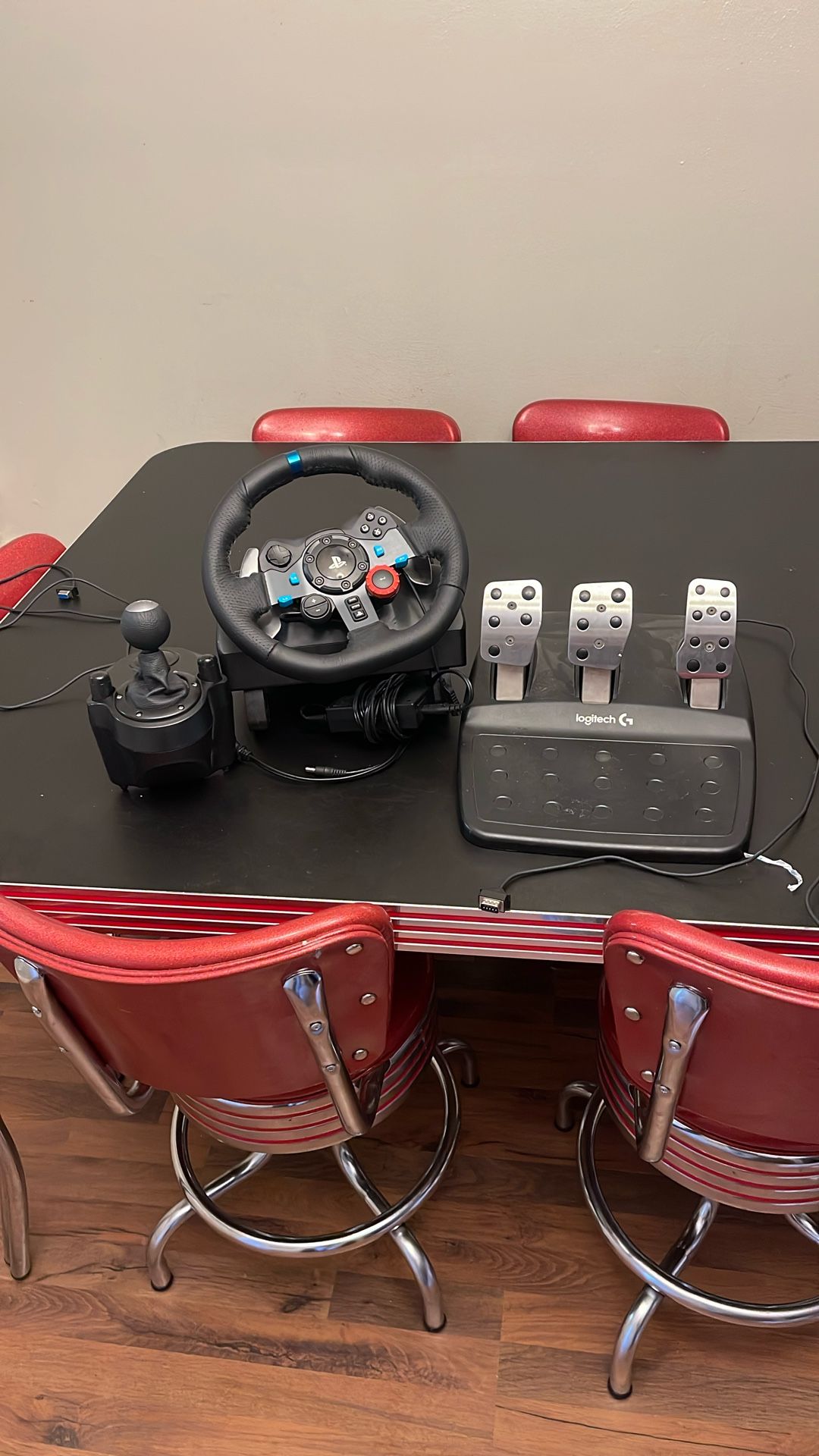 logitech g29 steering wheel, h shifter, and pedals