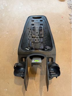 Two black Thule Yepp Maxi bike seats