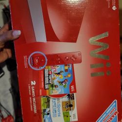 WII RED CONSOLE  ONLY WHAT YOU SEE IN THE PICTURES 