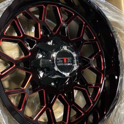 Red with black offroad wheels. 20x10