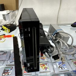 Nintendo Wii with Wii Plus Controller & Nunchuck ( Bolsa Bazaar)
