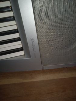 YAMAHA PORTABLE GRAND PIANO