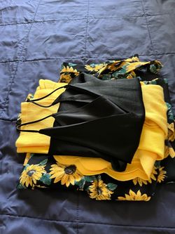 Sunflower Print Skirt Set with Tops the size of the skirt is M & the size of the top is L & M all of them for $35 Total