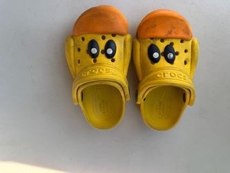Cute yellow duck Crocs.