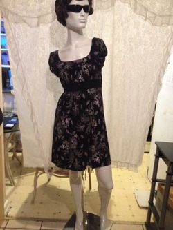 Speechless floral Sundress stretches for a comfortable and accommodating fit short sleeves polyester /spandex measurement Bust 34"-38" waist 28"-40"