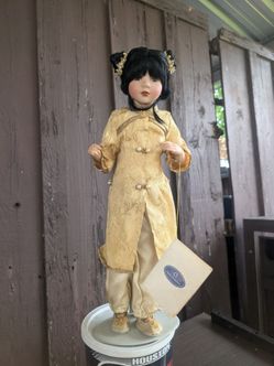 Porcelain Doll in Gold Brocade Outfit