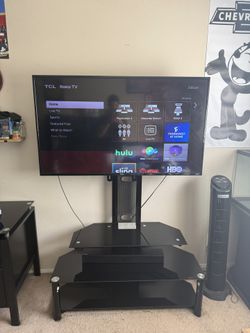 Complete Entertainment Bundle: Swivel TV Stand, Samsung Soundbar, and 50" TCL Roku Smart TV
