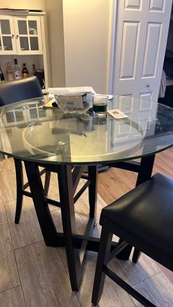 Kitchen glass top table like new I need to move it. It’s too big. $125