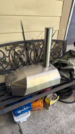 This is an  Karu 12 - 's portable outdoor pizza oven. Used only 1 time