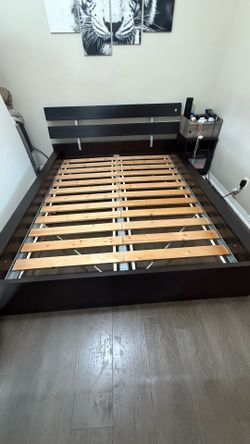 Queen wooden bed frame.