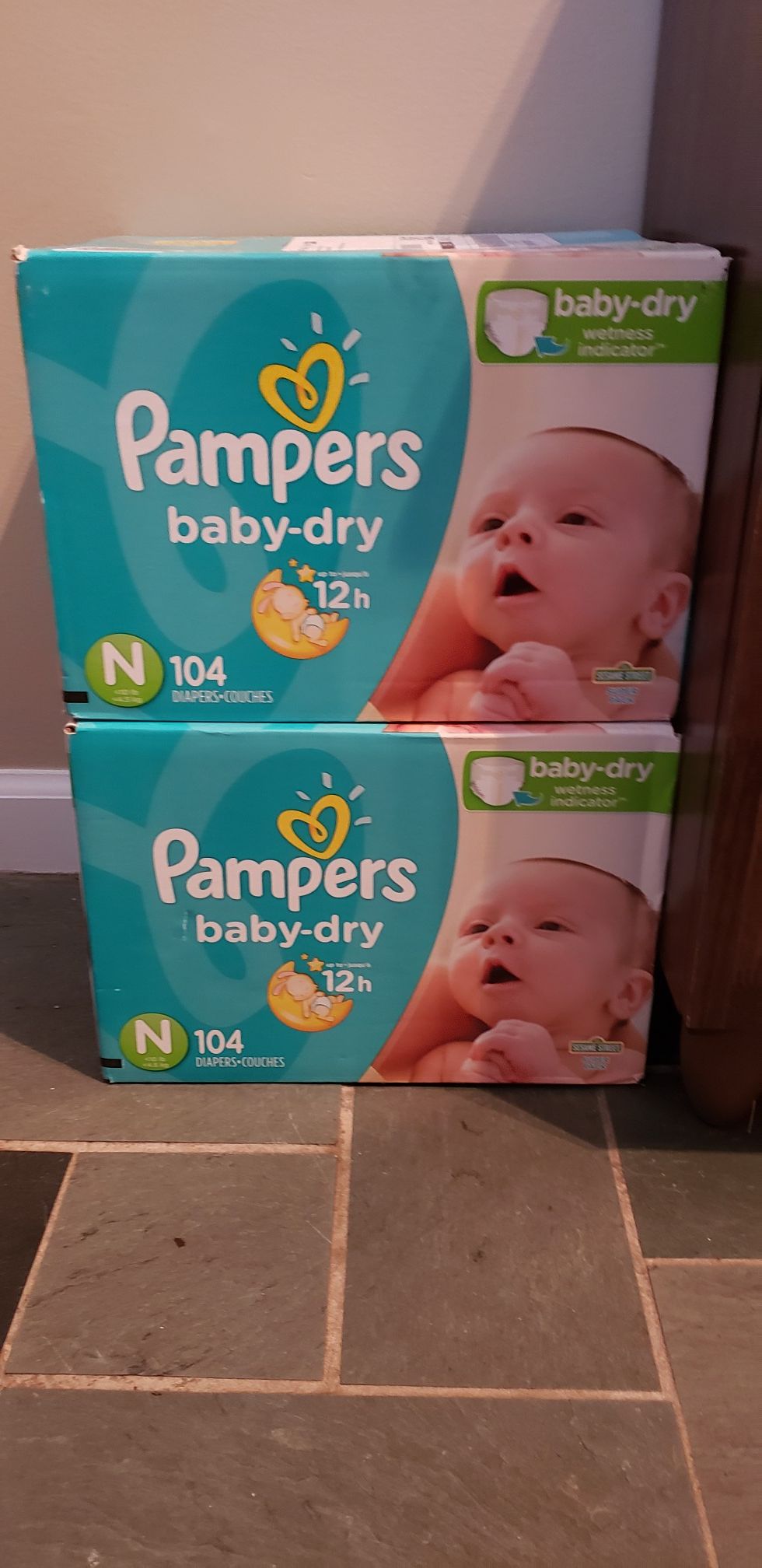 Unopened newborn diapers (1 box)