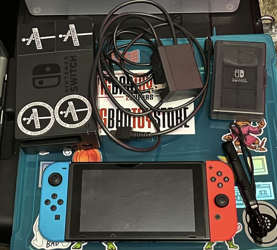 switch 1 version 2 bundle with accesories and metal gear solid collection