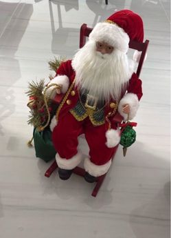 Santa Claus Figure on Red Rocking Chair