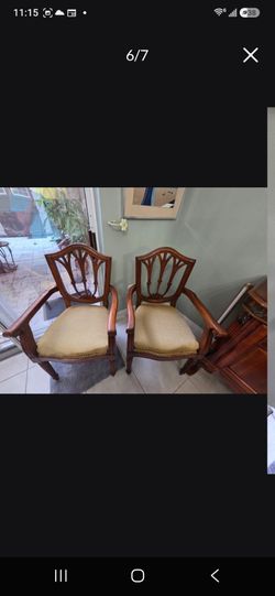 2 chairs made of fine wood