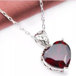 Heart shaped garnet pendant on 925 smooth chain. 