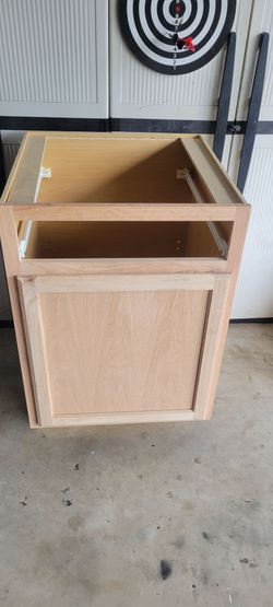 24 in cabinet. New. no drawer.for $20