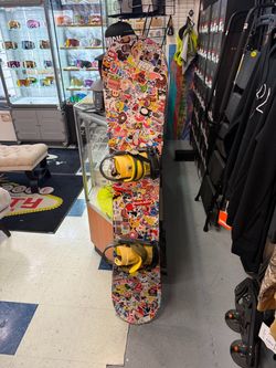 Liquid 152 snowboard and bindings located at sin city snowboards