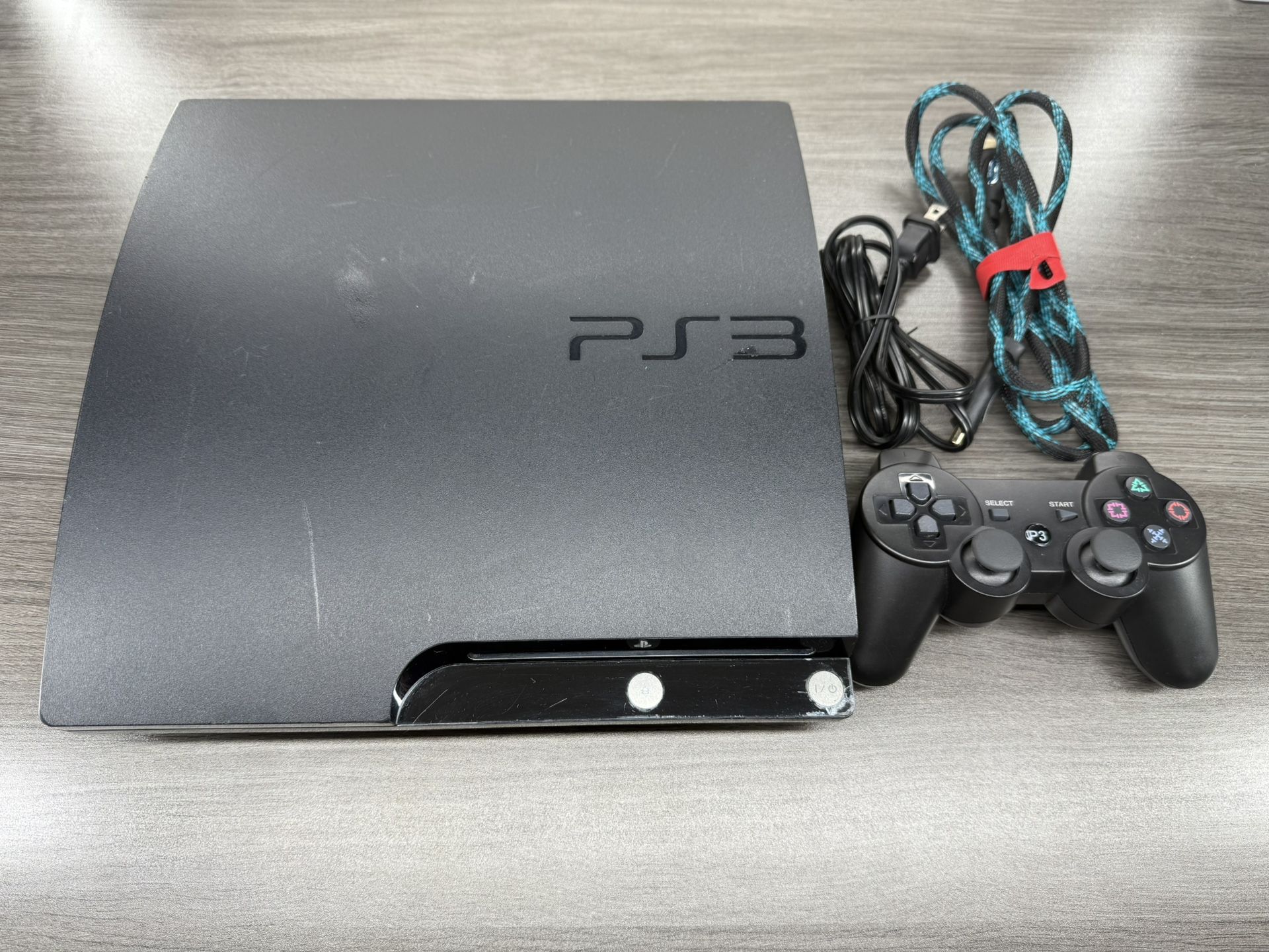 Sony PlayStation 3 Slim PS3 With Games