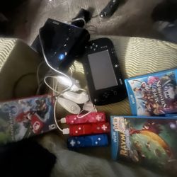 Nintendo Wii package games, controllers, console, and Nintendo Wii portable