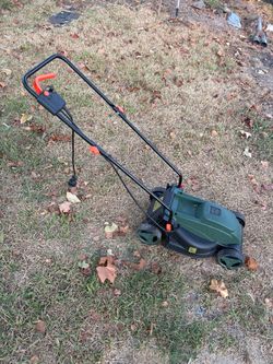Electric corded lawnmower and battery powered weed eater