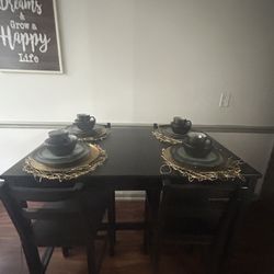 Dining Table + 4 Chairs – Moving Sale( dishes Not Included).