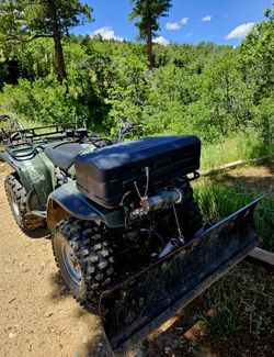 Honda fourtraxx 4x4, with plow and rack.
