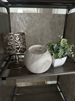 Candle holders and faux plant