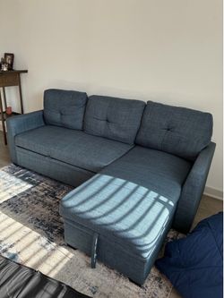 Blue-Grey Sectional Sofa with Pull-out Guest Bed and Hidden Storage