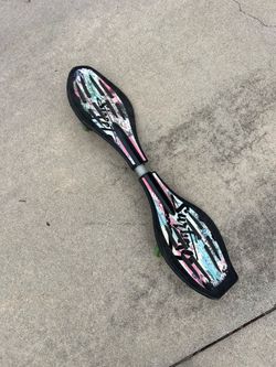 Wave rider multi-colored skateboard