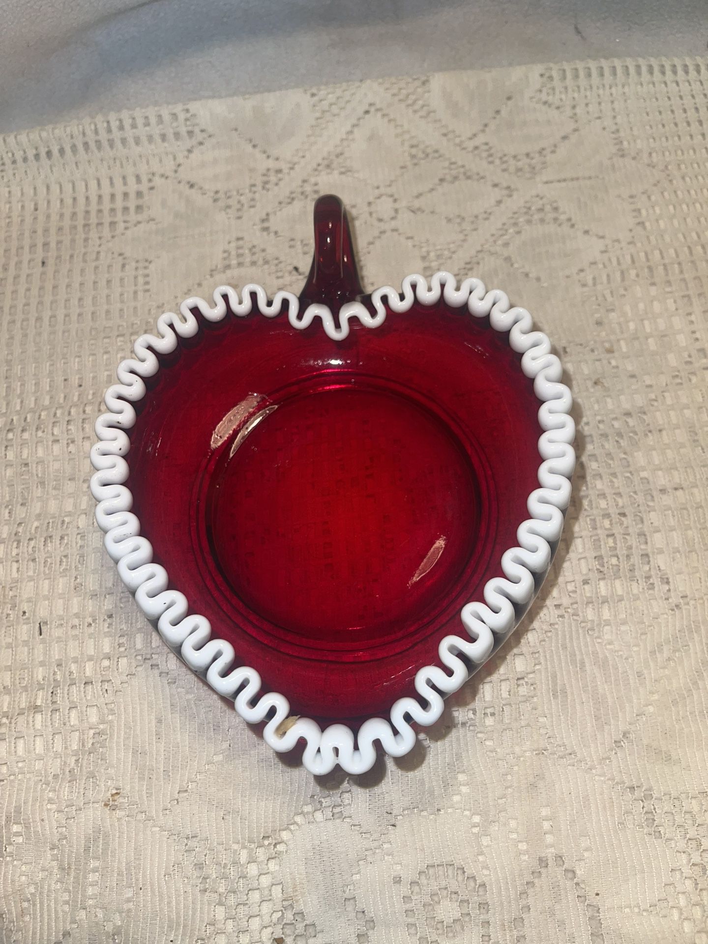 Fenton heart shaped red snow white ruffled edge. No chips or cracks.