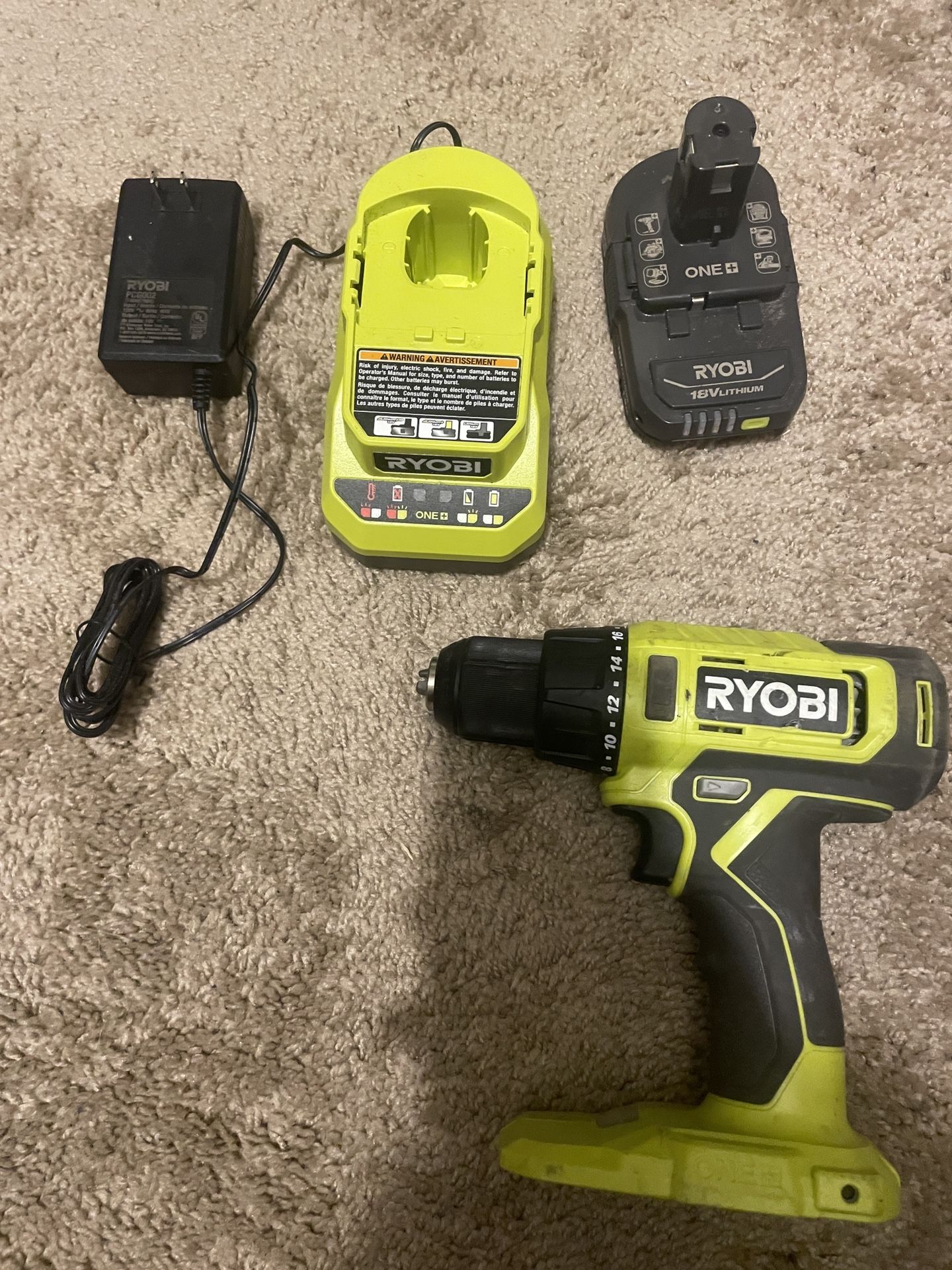Ryobi drill battery + charger 