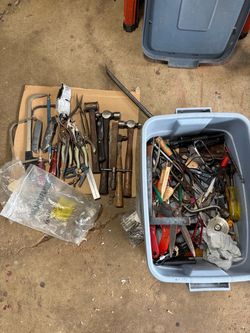 Bin full of miscellaneous tools and things.