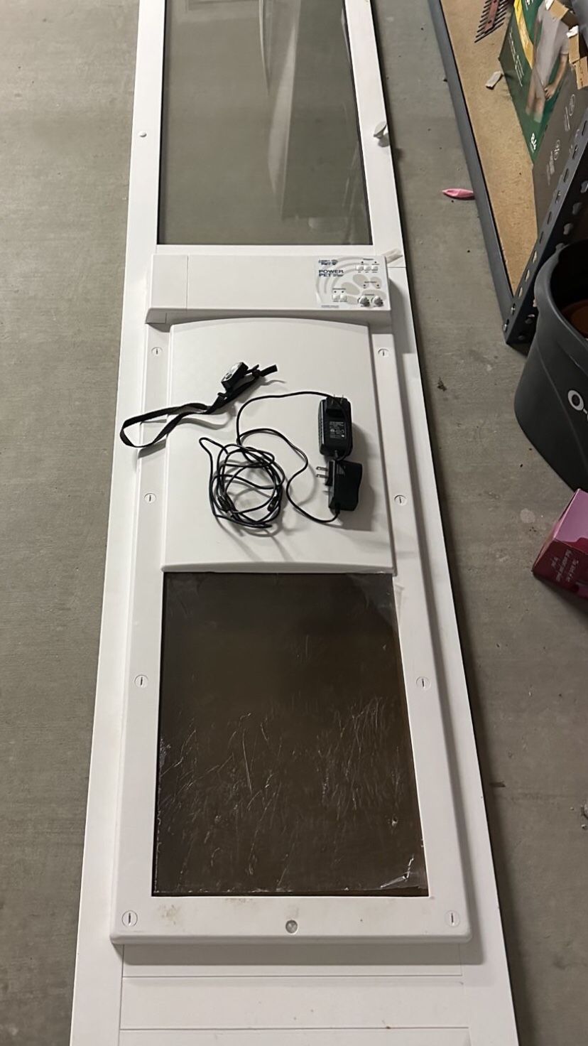 ELECTRIC DOG DOOR High Tech Pet Products Large Power Automatic Sliding Glass Pet Patio Door. automatic dog door remote