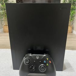 Microsoft Xbox One X Black 1TB Console with Black Xbox Controller