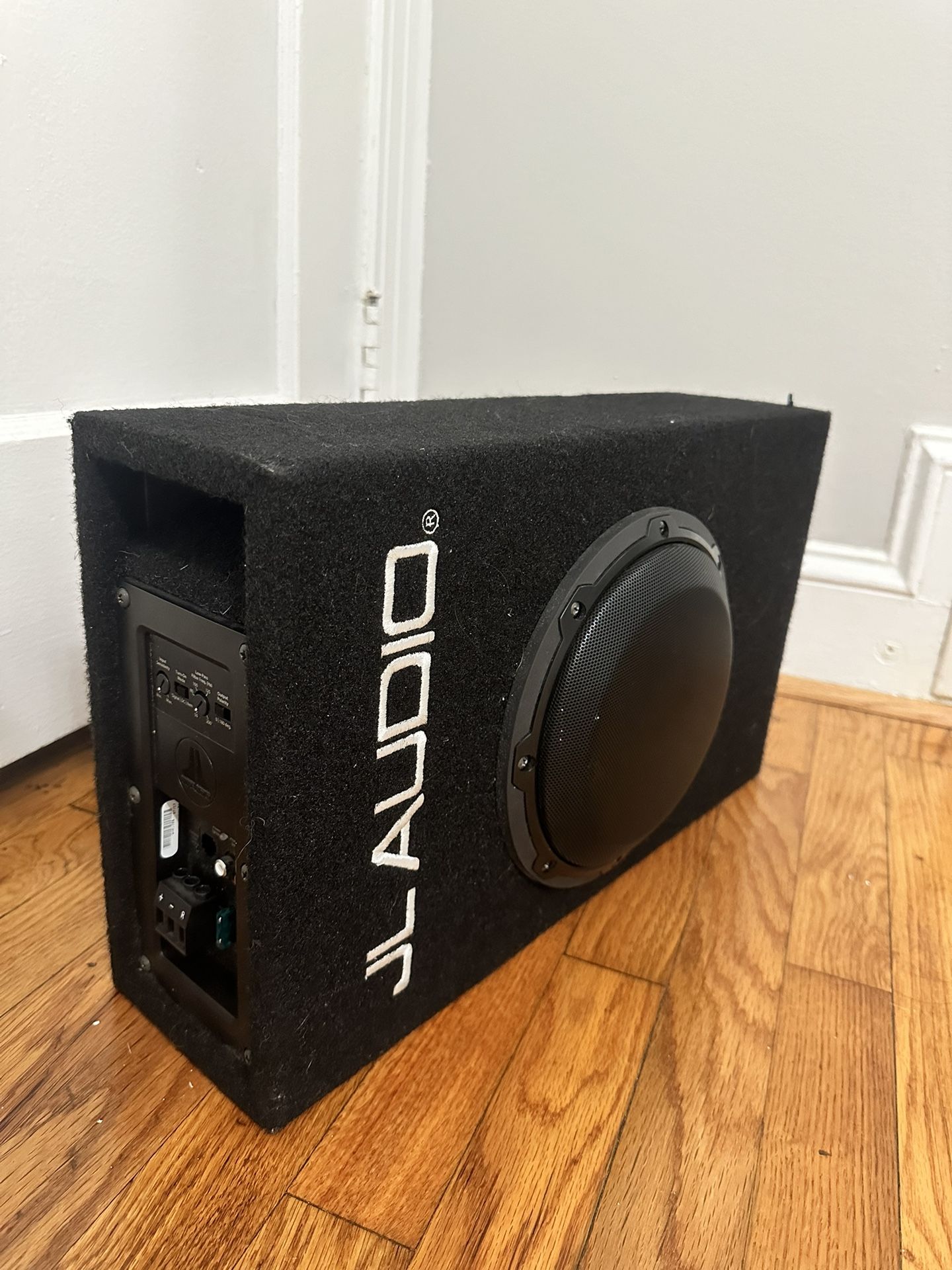 JL Audio 8 inch subwoofer with built in amplifier.