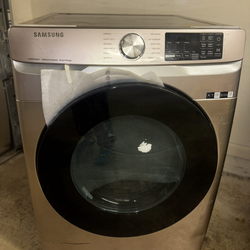 Brand new Samsung gas dryer with Steam and Moisture Sensor technology. Never used — just no box.