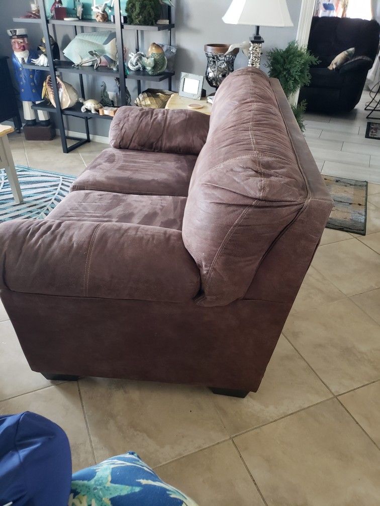 Ashley Faulk Leather Loveseat