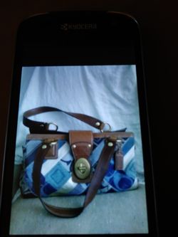 Unique patchwork coach bag.