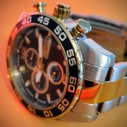 Invicta Tritnite Watch
Pro Drive, steel and gold plated, battery required