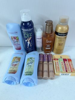 Beauty Bundle Take All For Price Listed. Burts Bees Chapsticks, Tarte Shape Tape Concealers, Deodorants, Sun Tanning Bronzers And Glitter Body Spray. 