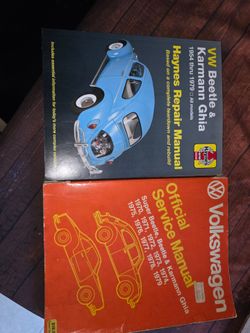 2 VW beetle repair books.