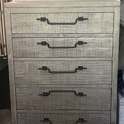 Tan 5 Drawer Dresser With Black Metal Handles