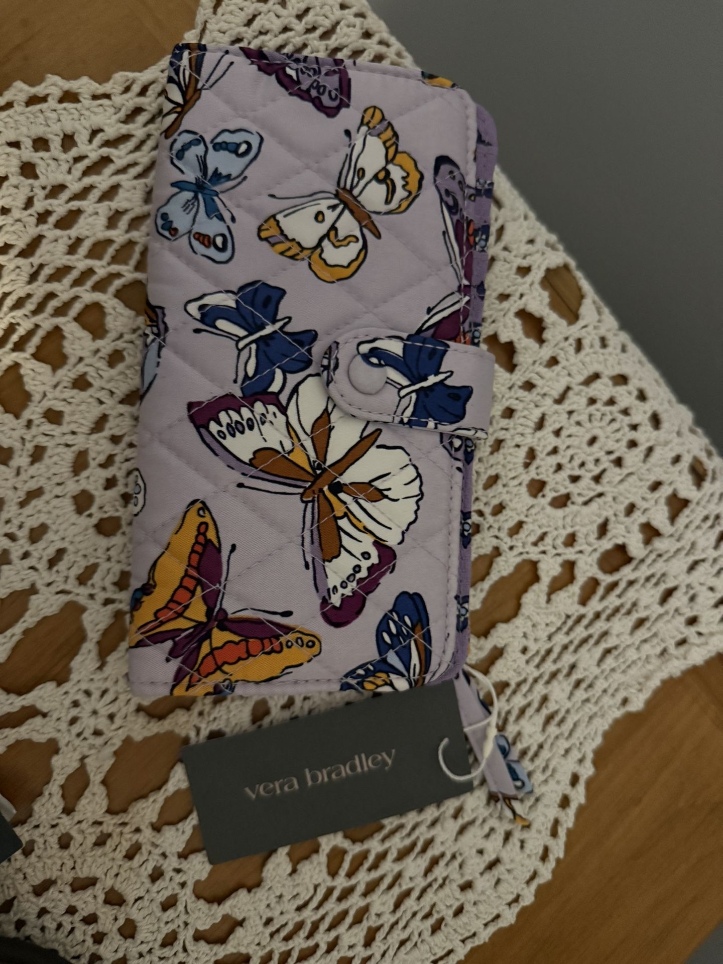 Brand new Vera Bradley tab wallet. See pictures for details. Comes from a smoke free home.