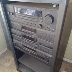 Kenwood Stereo. Multiple CD Player, Multiple Cassette Player,AM/FM Stereo,Integrated amplifier.
