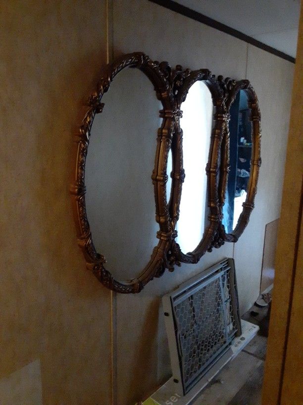Mid Century Regency rococo style Gold syroco three Ring Wall mirror