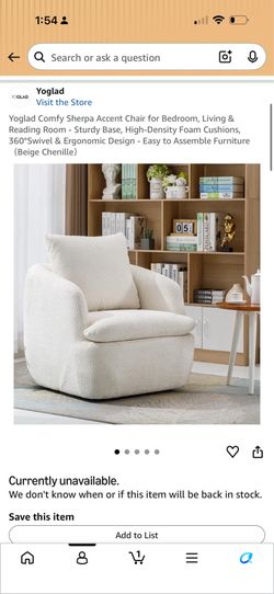 2 white boucle swivel chairs