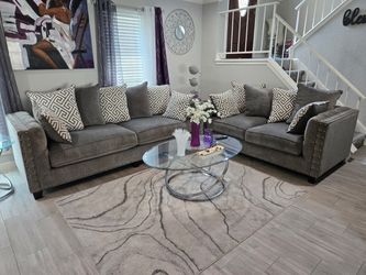 Grey sofa and loveseat